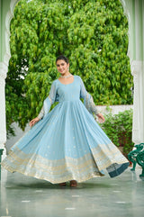 For the Blue Gown: Sky Blue Georgette Anarkali Gown with Shimmering Gold Mirror & Zari Work
